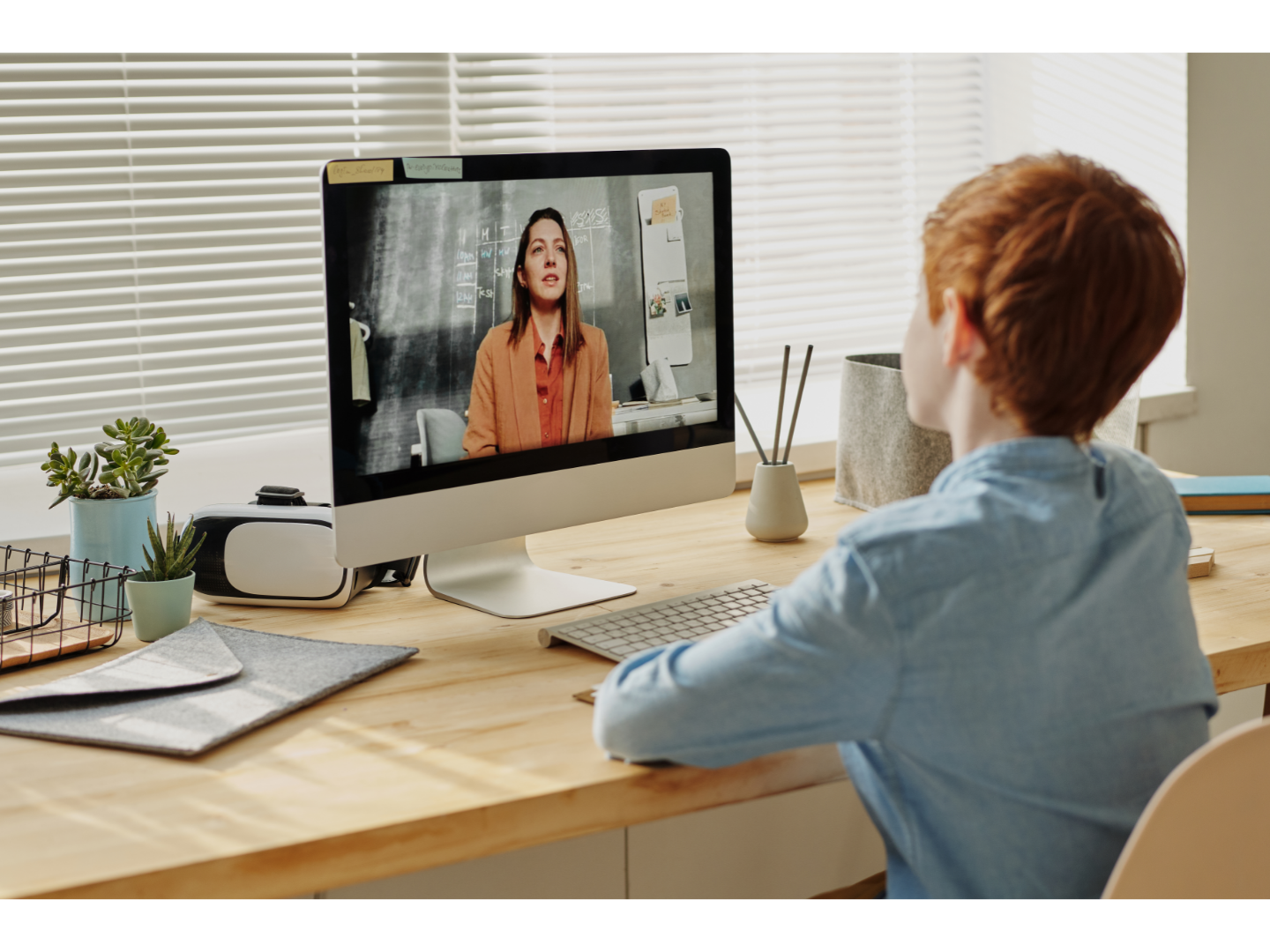 child learning with a remote online tutor